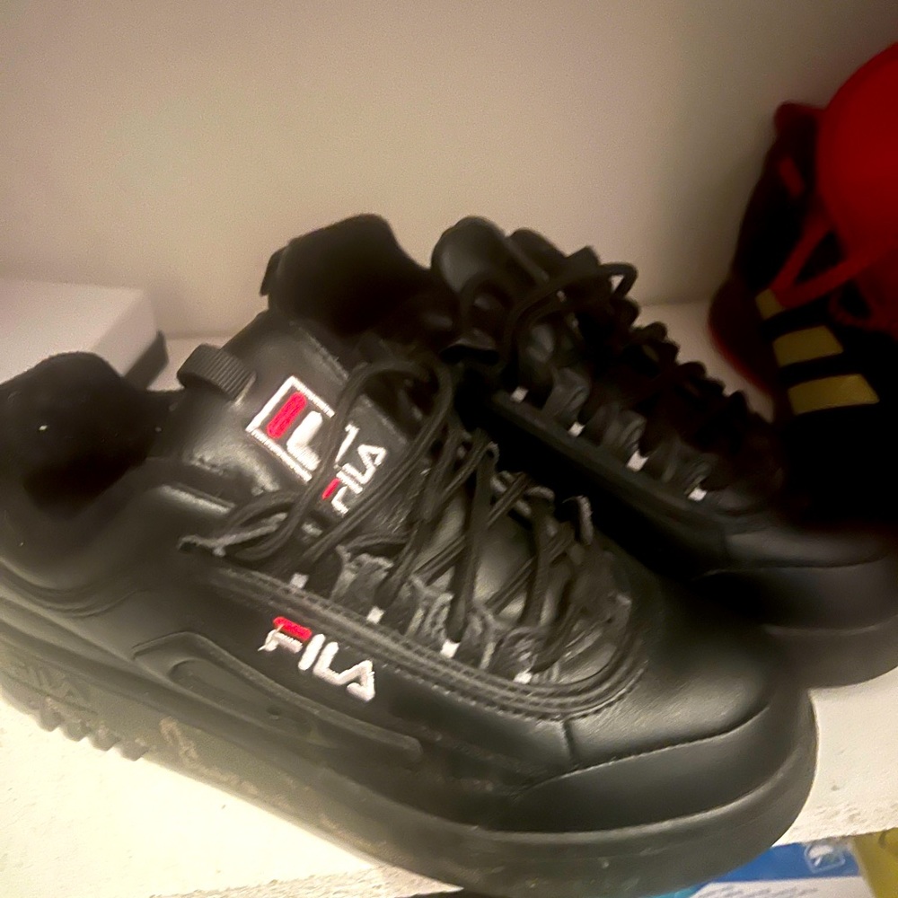 Kids Black leather Filas in good condition